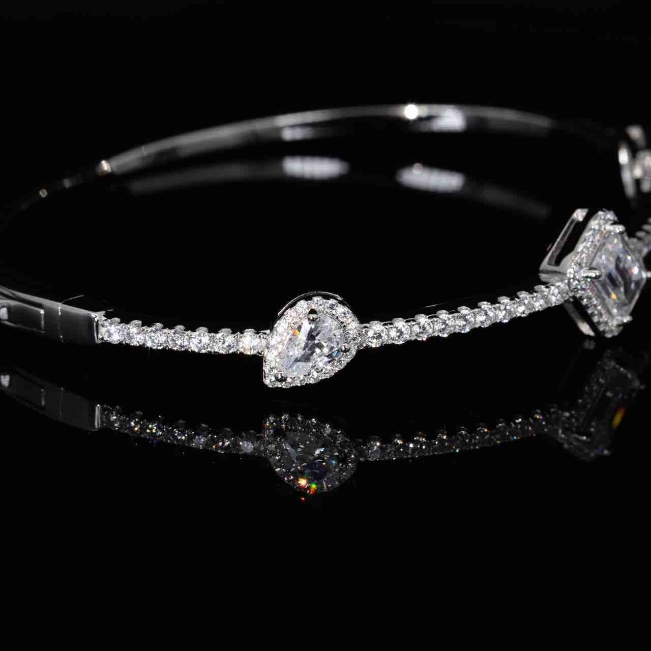 Omnia Eissha White Bangle With High Quality Simulated Diamonds In 925 Silver - OMNIASTORES KSA