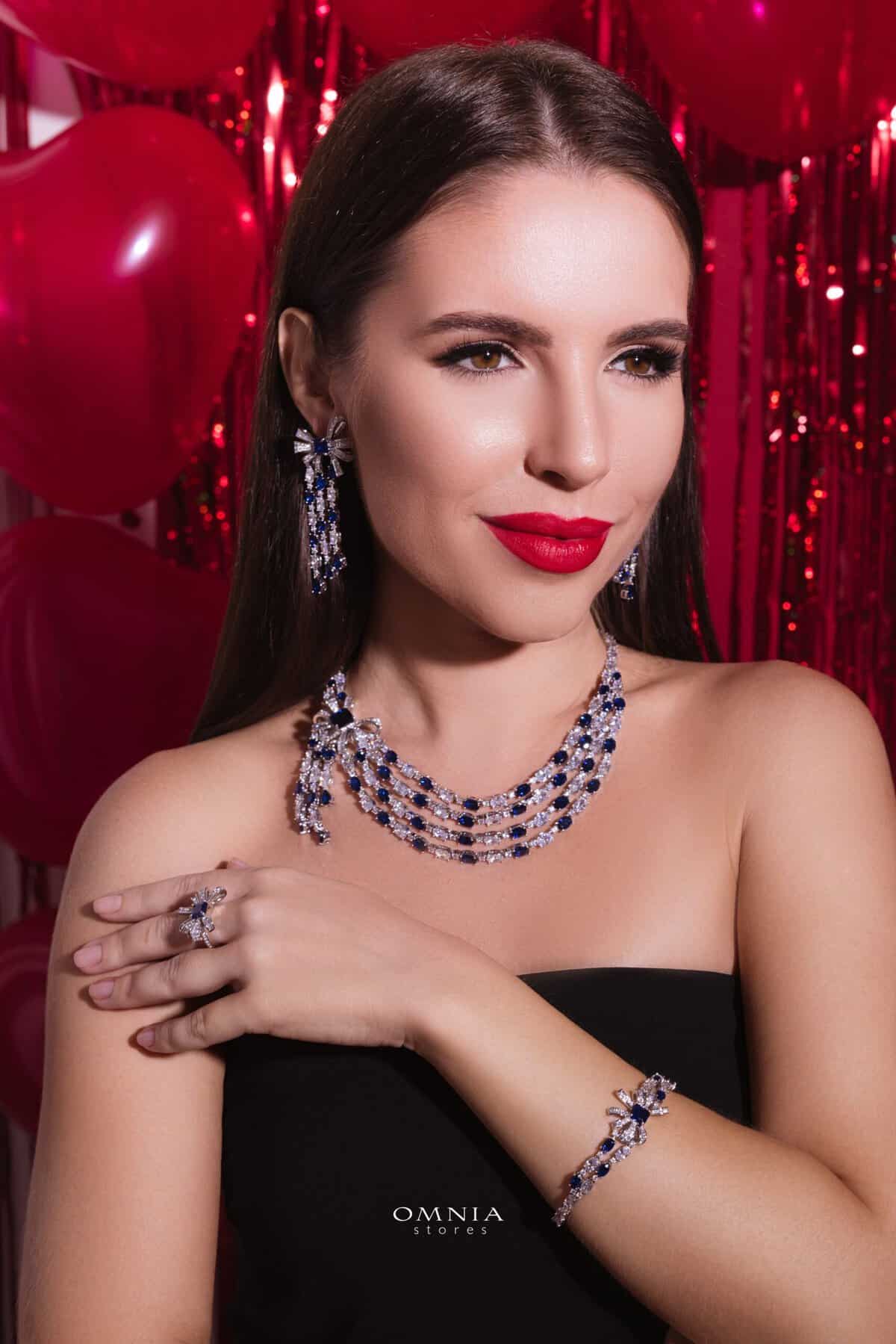 Omnia Mawada Blue Bridal Full Set with Elegant Bow-Accent Design and High-Quality Zircon Stones in Rhodium Plated Finish ( only available in KSA)