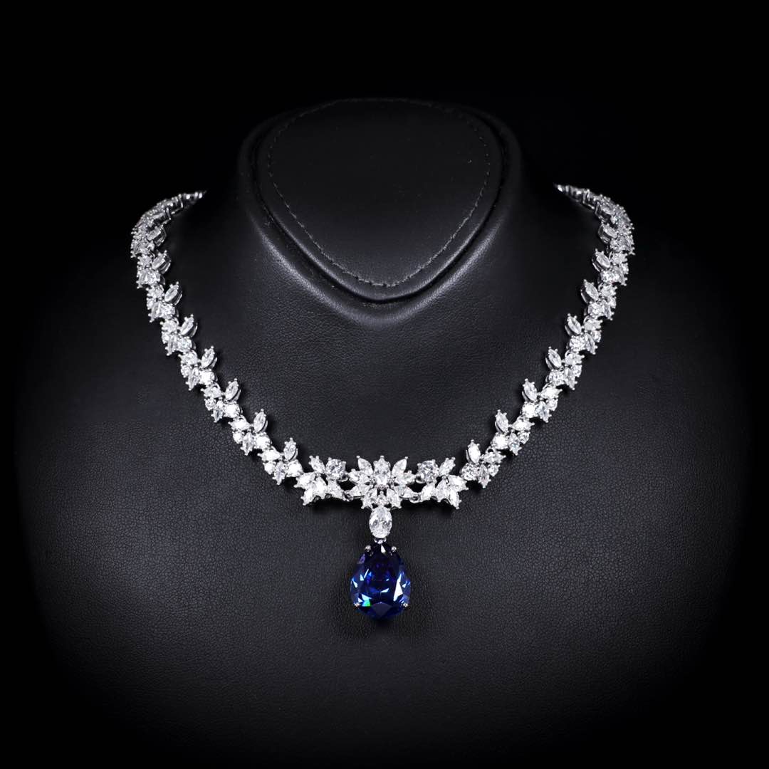 Omnia Vanya Blue Necklace & Earrings Set in 925 Silver with Pear-Cut High-Quality Simulated Diamonds - OMNIASTORES UAE