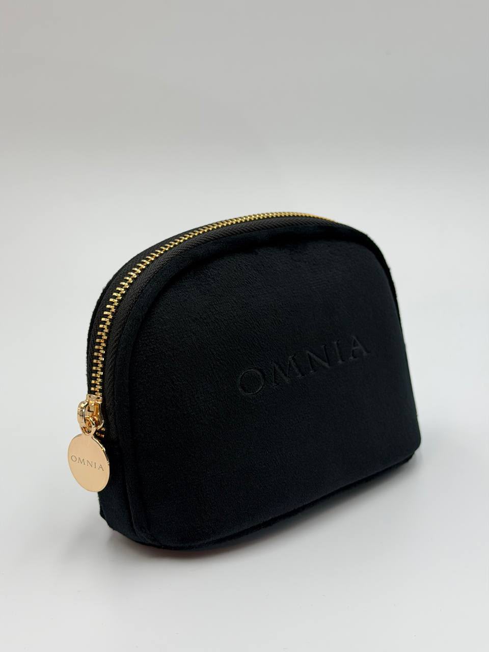 Omnia Clutch Bag
