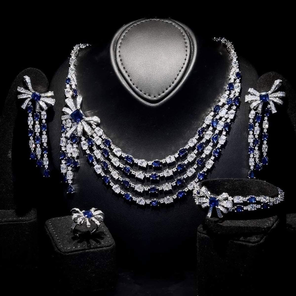 Omnia Mawada Blue Bridal Full Set with Elegant Bow-Accent Design and High-Quality Zircon Stones in Rhodium Plated Finish - OMNIASTORES UAE