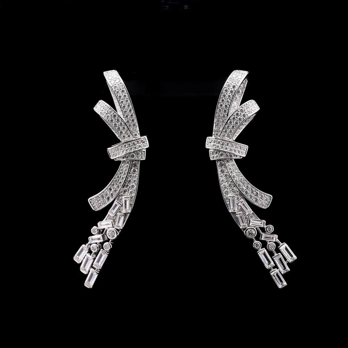 Omnia Celeste Bow Design Earrings in 92.5 Silver with High-Quality Simulated Diamonds and Elegant Dangling Accents - OMNIASTORES UAE