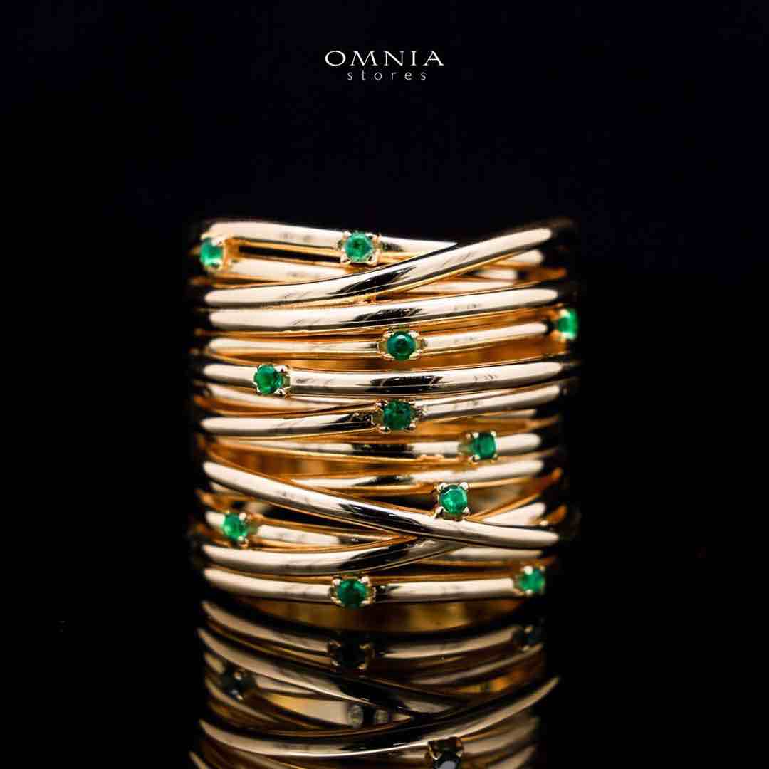 Omnia Dhuriyyah Golden Spiral Ring in 925 Silver with High-Quality Green Simulated Diamonds - OMNIASTORES KSA