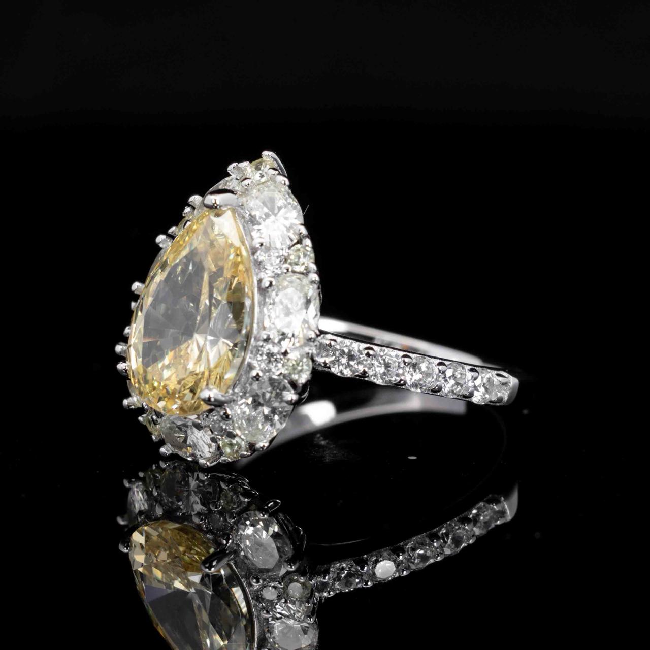 Taleeda Yellow Pear Cut Ring in 925 Silver With High Quality Simulated Diamonds
