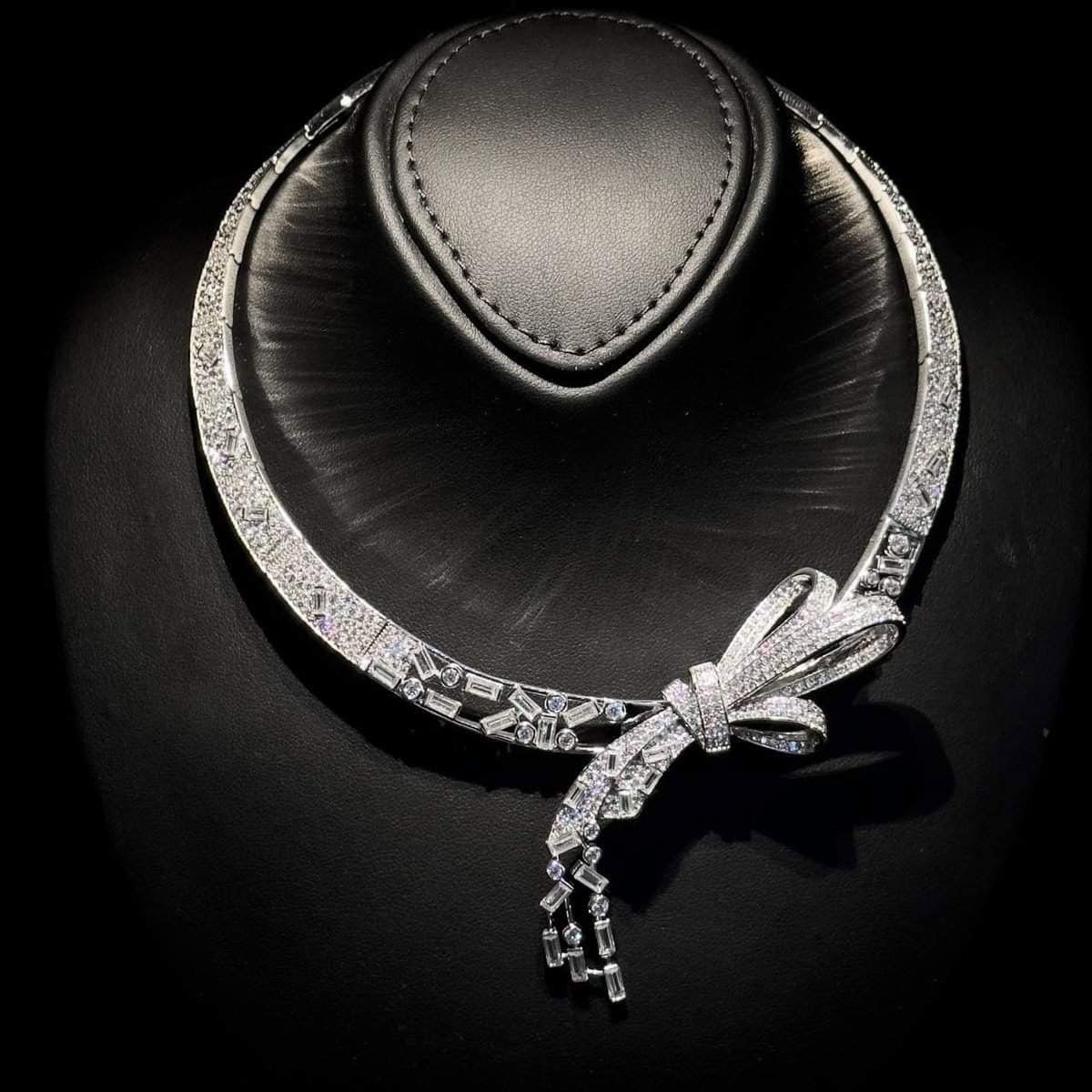 Omnia Celeste Bow Necklace in 925 Silver with High-Quality Simulated Diamonds and Elegant Geometric Detailing