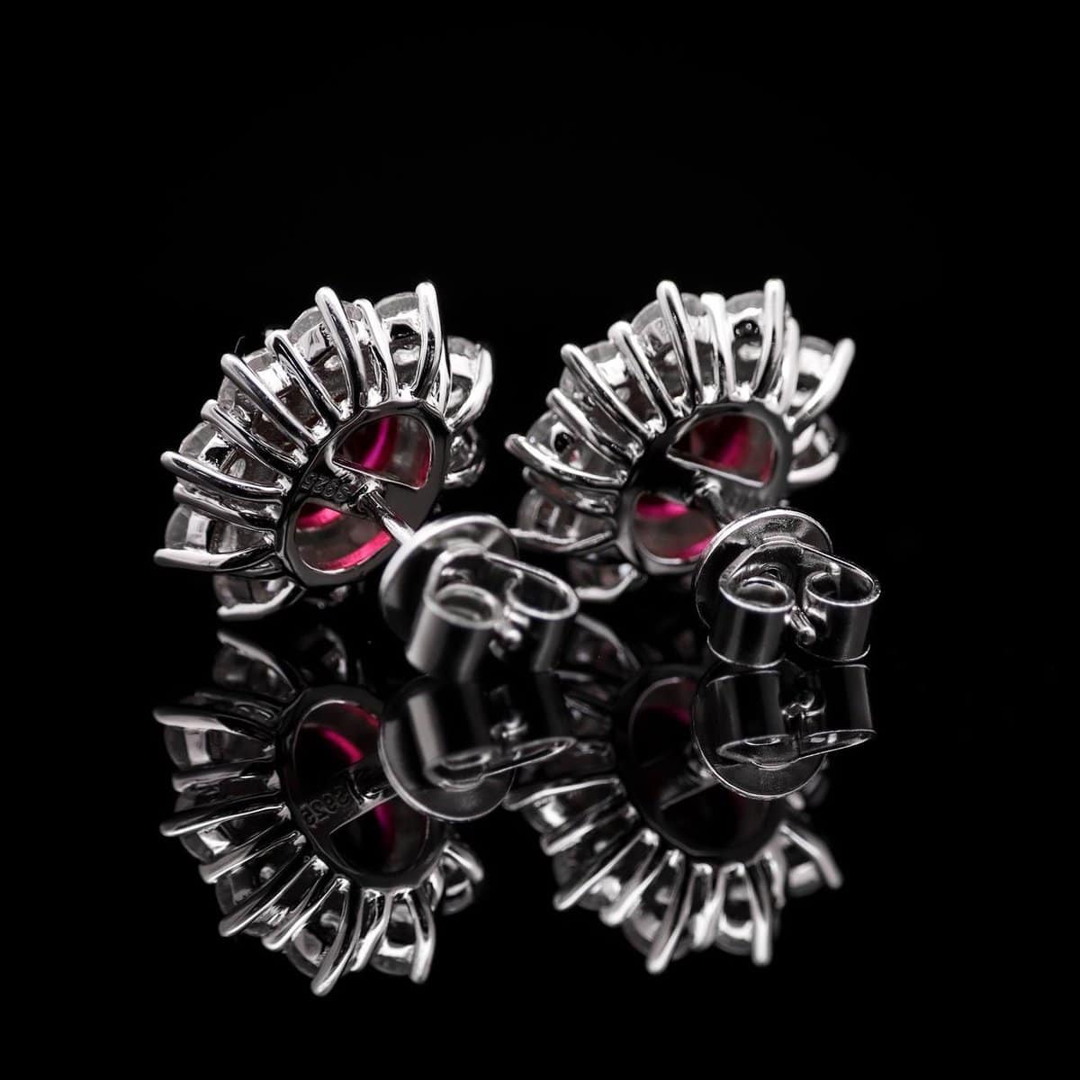 Omnia Elara Ruby Red Oval Stud Earrings in 92.5 Silver with High-Quality Simulated Diamonds - OMNIASTORES UAE