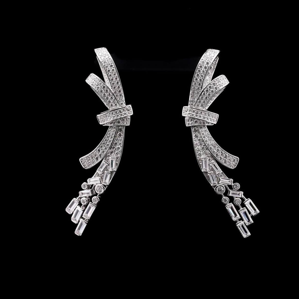 Omnia Celeste Bow Design Earrings in 92.5 Silver with High-Quality Simulated Diamonds and Elegant Dangling Accents - OMNIASTORES UAE