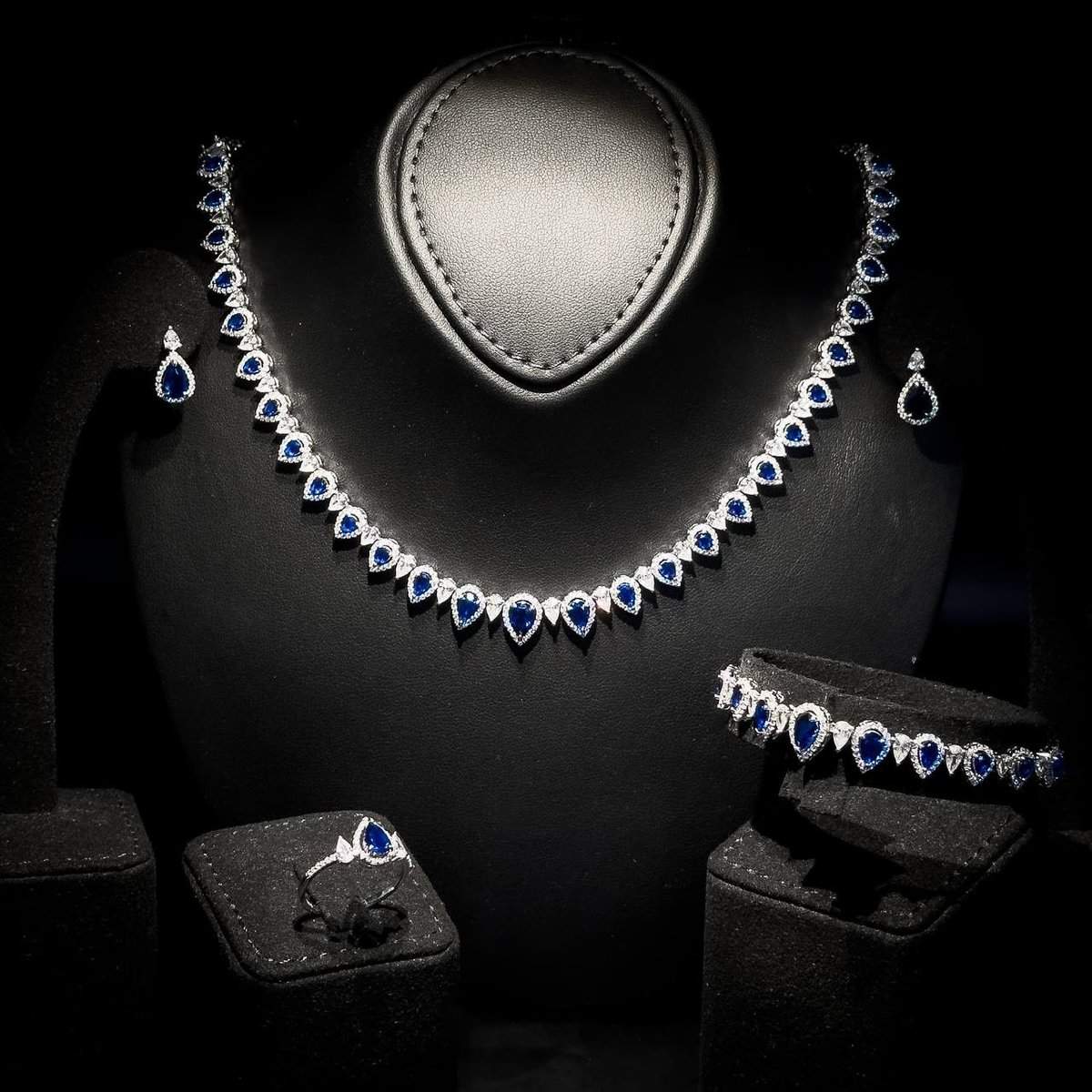 Omnia Sapphire Elegance Bridal Set in 925 Silver, Rhodium-Plated, with Pear-Cut Simulated Sapphires & Halo Accents - OMNIASTORES UAE