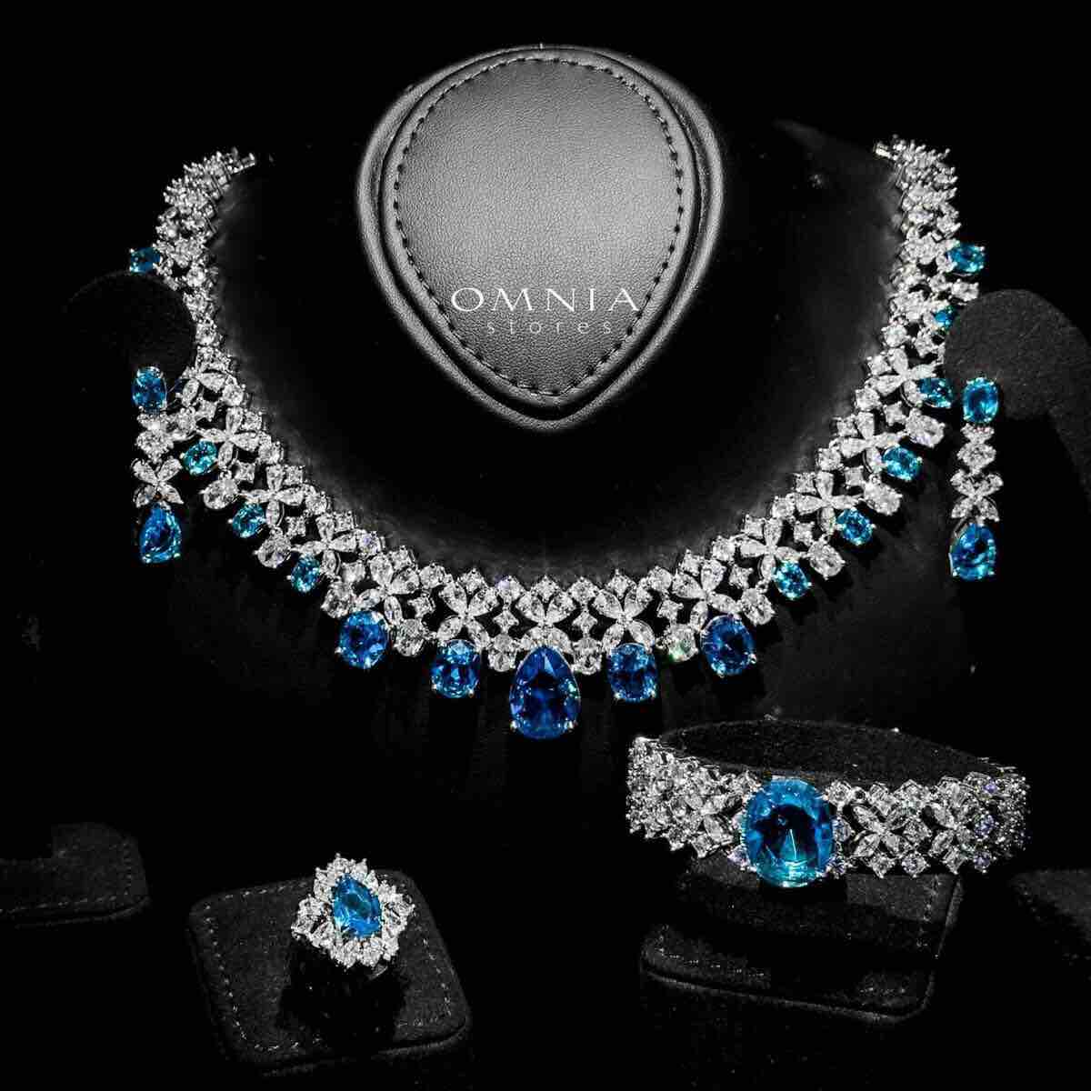 Omnia Suhana Sky Blue Bridal Full Set Designed with Pear-Cut and Round Simulated Diamonds in High-Quality Rhodium Plated Finish - OMNIASTORES KSA