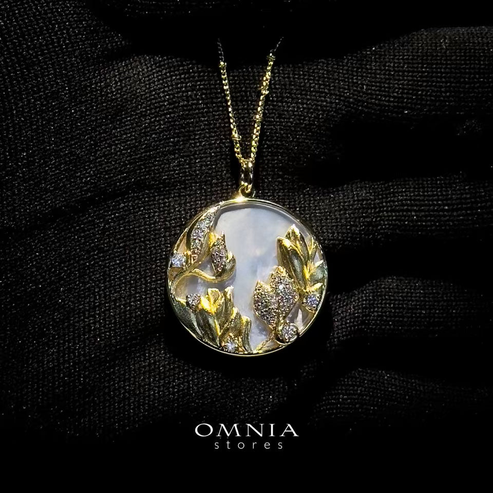 Omnia Aurelia White Shell Mother of Pearl Round Pendant Necklace with Floral Zircon Accents in Brass with Gold Plated Finish - OMNIASTORES UAE