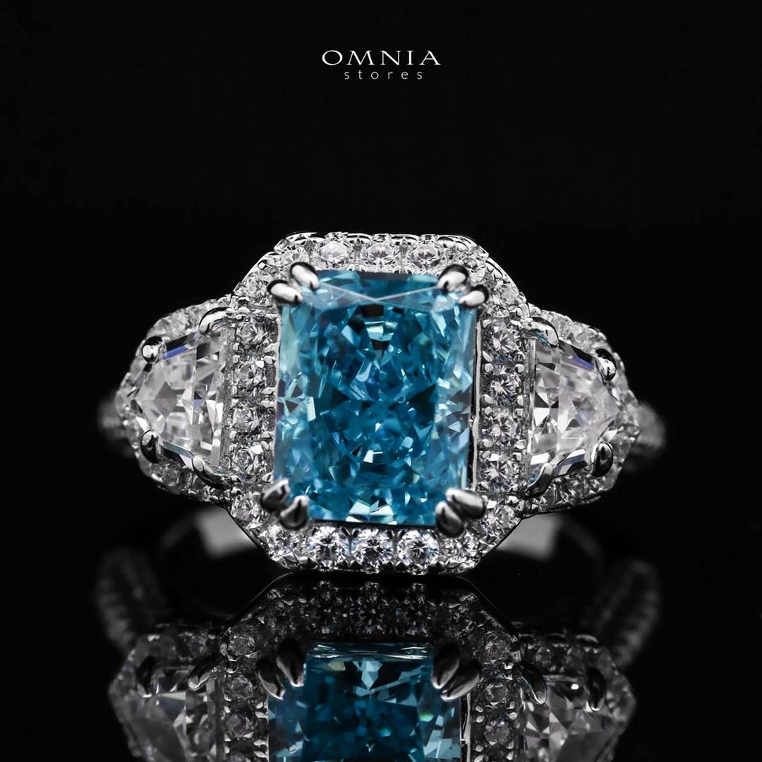 Omnia Aseel Radiant Cut Sky Blue Ring in 92.5 Silver with High Quality Simulated Diamonds